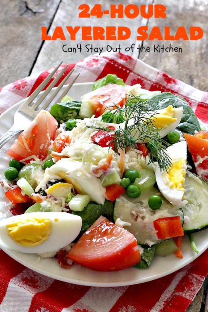 24-Hour Layered Salad | Can't Stay Out of the Kitchen | Wow, I absolutely love this stuff! This #salad has so many layers & tastes absolutely awesome. We love to serve it for potlucks, backyard #BBQs and summer #holidays like #FathersDay, #FourthofJuly & #LaborDay. #bacon #romano #glutenfree