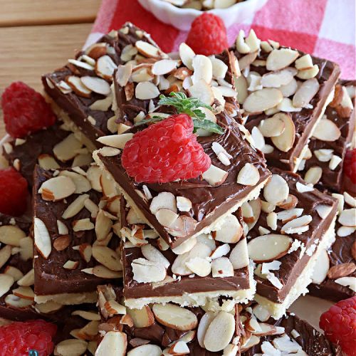 Almond Fudge Shortbread | Can't Stay Out of the Kitchen | This luscious, fudge, chocolaty #shortbread #recipe is rich, decadent & heavenly. Wow your family & friends with this fantastic #cookie at your next #potluck, #tailgating party, #BackyardBarbecue or even #holiday baking & a #ChristmasCookieExchange. Every bite will have you swooning! #Almonds #Fudge #dessert #AlmondFudgeShortbread #ChocolateDessert