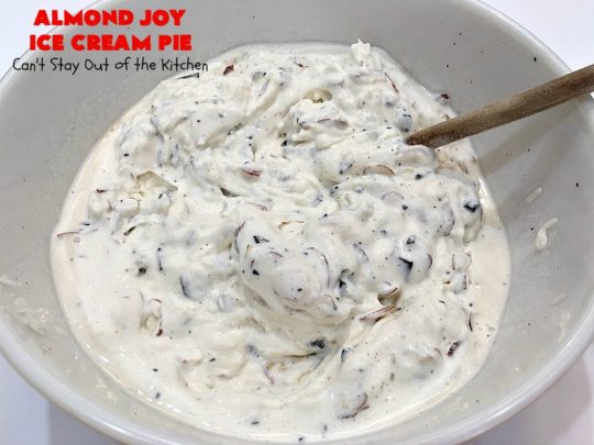 Almond Joy Ice Cream Pie | Can't Stay Out of the Kitchen | this spectacular 4-ingredient #recipe will knock your socks off! It's the ultimate #dessert for #Easter, #MothersDay or other special occasions. It tastes like eating #AlmondJoyBars but in #IceCream form! #AlmondJoyDessert #ChocolateDessert #IceCreamDessert #HolidayDessert #EasterDessert #MothersDayDessert #coconut #almonds #chocolate