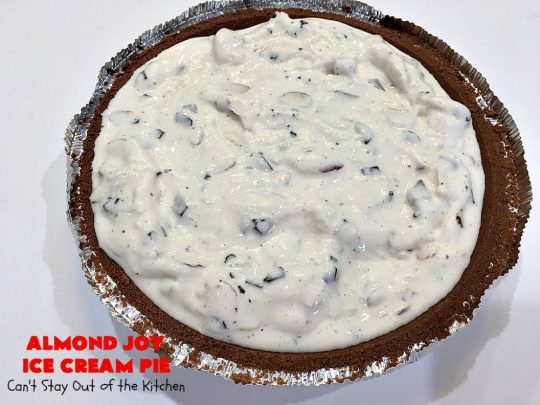 Almond Joy Ice Cream Pie | Can't Stay Out of the Kitchen | this spectacular 4-ingredient #recipe will knock your socks off! It's the ultimate #dessert for #Easter, #MothersDay or other special occasions. It tastes like eating #AlmondJoyBars but in #IceCream form! #AlmondJoyDessert #ChocolateDessert #IceCreamDessert #HolidayDessert #EasterDessert #MothersDayDessert #coconut #almonds #chocolate