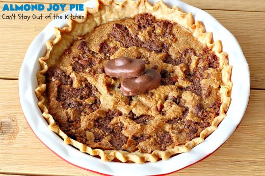 Almond Joy Pie | Can't Stay Out of the Kitchen | this fantastic #pie is filled with #AlmondJoyBars. So it's loaded with #chocolate, #coconut & #almonds. Every bite is breathtaking. Great #dessert for company or #holidays like #ValentinesDay. #HolidayDessert #ValentinesDayDessert #AlmondJoyDessert #AlmondJoyPie #ChocolateDessert #CoconutDessert #AlmondDessert