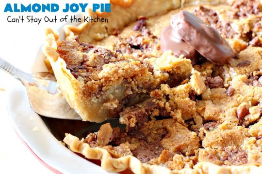 Almond Joy Pie | Can't Stay Out of the Kitchen | this fantastic #pie is filled with #AlmondJoyBars. So it's loaded with #chocolate, #coconut & #almonds. Every bite is breathtaking. Great #dessert for company or #holidays like #ValentinesDay. #HolidayDessert #ValentinesDayDessert #AlmondJoyDessert #AlmondJoyPie #ChocolateDessert #CoconutDessert #AlmondDessert