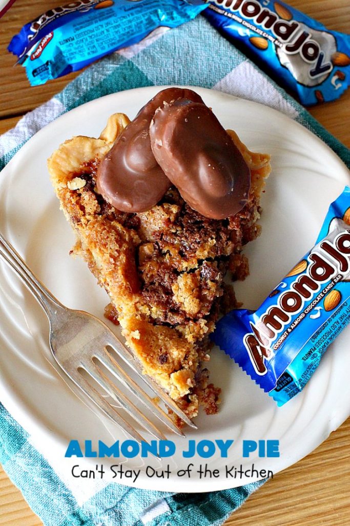 Almond Joy Pie | Can't Stay Out of the Kitchen | this fantastic #pie is filled with #AlmondJoyBars. So it's loaded with #chocolate, #coconut & #almonds. Every bite is breathtaking. Great #dessert for company or #holidays like #ValentinesDay. #HolidayDessert #ValentinesDayDessert #AlmondJoyDessert #AlmondJoyPie #ChocolateDessert #CoconutDessert #AlmondDessert
