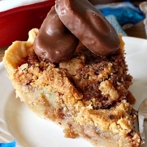 Almond Joy Pie | Can't Stay Out of the Kitchen | this fantastic #pie is filled with #AlmondJoyBars. So it's loaded with #chocolate, #coconut & #almonds. Every bite is breathtaking. Great #dessert for company or #holidays like #ValentinesDay. #HolidayDessert #ValentinesDayDessert #AlmondJoyDessert #AlmondJoyPie #ChocolateDessert #CoconutDessert #AlmondDessert