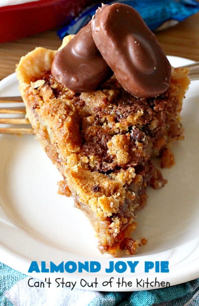 Almond Joy Pie | Can't Stay Out of the Kitchen | this fantastic #pie is filled with #AlmondJoyBars. So it's loaded with #chocolate, #coconut & #almonds. Every bite is breathtaking. Great #dessert for company or #holidays like #ValentinesDay. #HolidayDessert #ValentinesDayDessert #AlmondJoyDessert #AlmondJoyPie #ChocolateDessert #CoconutDessert #AlmondDessert