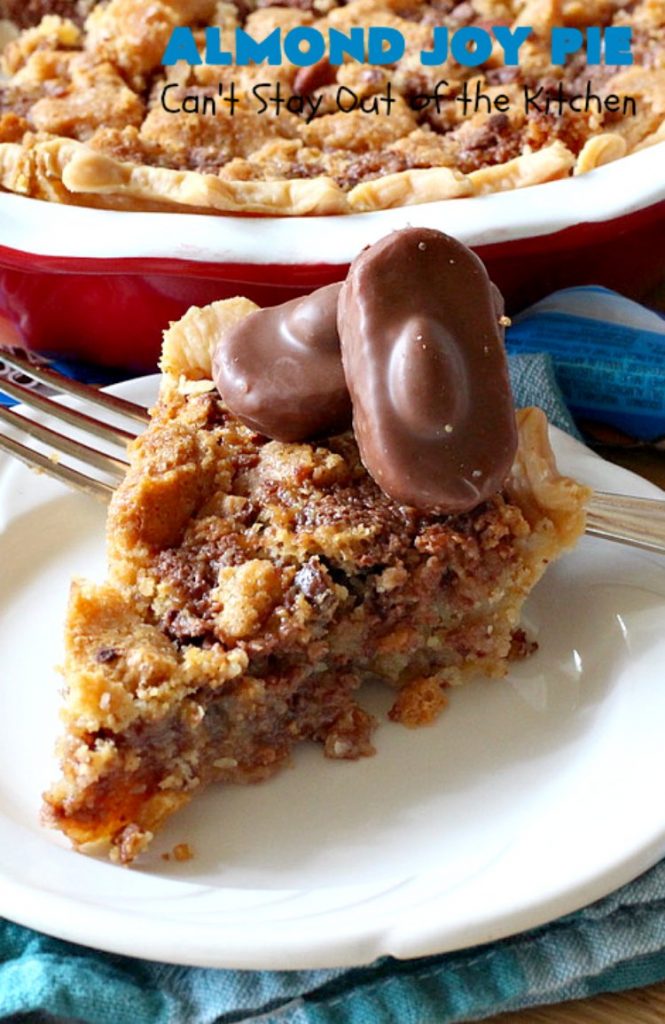 Almond Joy Pie | Can't Stay Out of the Kitchen | this fantastic #pie is filled with #AlmondJoyBars. So it's loaded with #chocolate, #coconut & #almonds. Every bite is breathtaking. Great #dessert for company or #holidays like #ValentinesDay. #HolidayDessert #ValentinesDayDessert #AlmondJoyDessert #AlmondJoyPie #ChocolateDessert #CoconutDessert #AlmondDessert