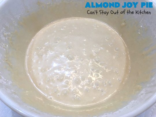 Almond Joy Pie | Can't Stay Out of the Kitchen | this fantastic #pie is filled with #AlmondJoyBars. So it's loaded with #chocolate, #coconut & #almonds. Every bite is breathtaking. Great #dessert for company or #holidays like #ValentinesDay. #HolidayDessert #ValentinesDayDessert #AlmondJoyDessert #AlmondJoyPie #ChocolateDessert #CoconutDessert #AlmondDessert
