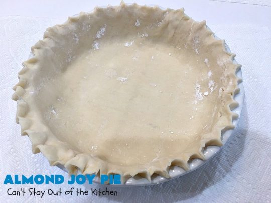 Almond Joy Pie | Can't Stay Out of the Kitchen | this fantastic #pie is filled with #AlmondJoyBars. So it's loaded with #chocolate, #coconut & #almonds. Every bite is breathtaking. Great #dessert for company or #holidays like #ValentinesDay. #HolidayDessert #ValentinesDayDessert #AlmondJoyDessert #AlmondJoyPie #ChocolateDessert #CoconutDessert #AlmondDessert