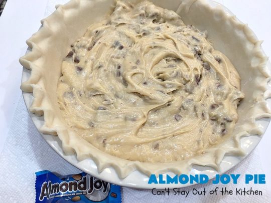 Almond Joy Pie | Can't Stay Out of the Kitchen | this fantastic #pie is filled with #AlmondJoyBars. So it's loaded with #chocolate, #coconut & #almonds. Every bite is breathtaking. Great #dessert for company or #holidays like #ValentinesDay. #HolidayDessert #ValentinesDayDessert #AlmondJoyDessert #AlmondJoyPie #ChocolateDessert #CoconutDessert #AlmondDessert
