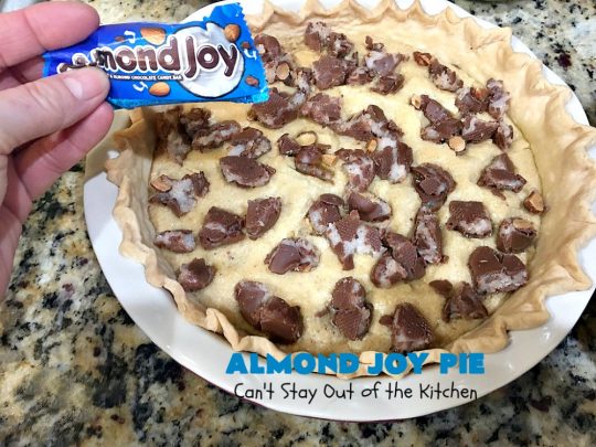 Almond Joy Pie | Can't Stay Out of the Kitchen | this fantastic #pie is filled with #AlmondJoyBars. So it's loaded with #chocolate, #coconut & #almonds. Every bite is breathtaking. Great #dessert for company or #holidays like #ValentinesDay. #HolidayDessert #ValentinesDayDessert #AlmondJoyDessert #AlmondJoyPie #ChocolateDessert #CoconutDessert #AlmondDessert