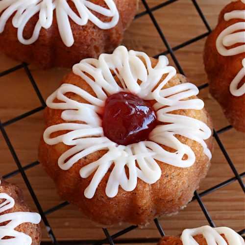 Almond Poppyseed Tea Cakes | Can't Stay Out of the Kitchen | these amazing #TeaCakes are irresistible & mouthwatering. They include both #almond flavoring & #almonds along with #poppyseeds to give flavor & texture to the #cake. These are fantastic for #holiday or #Christmas parties, but delightful enough to make all year long. Prepare to drool over every bite! #dessert #HolidayDessert #AlmondPoppyseedTeaCakes