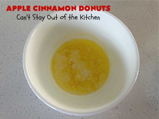 Apple Cinnamon Donuts | Can't Stay Out of the Kitchen | Brighten up your day with a batch of these fantastic #donuts. #AppleCinnamonDonuts include both #applesauce & #apples & they're rolled in melted butter and dredged in a #cinnamon-sugar mixture. Terrific for a weekend, company or #holiday #breakfast. You'll be swooning from the first bite! #HolidayBreakfast