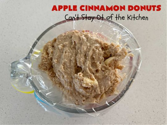 Apple Cinnamon Donuts | Can't Stay Out of the Kitchen | Brighten up your day with a batch of these fantastic #donuts. #AppleCinnamonDonuts include both #applesauce & #apples & they're rolled in melted butter and dredged in a #cinnamon-sugar mixture. Terrific for a weekend, company or #holiday #breakfast. You'll be swooning from the first bite! #HolidayBreakfast