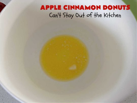 Apple Cinnamon Donuts | Can't Stay Out of the Kitchen | Brighten up your day with a batch of these fantastic #donuts. #AppleCinnamonDonuts include both #applesauce & #apples & they're rolled in melted butter and dredged in a #cinnamon-sugar mixture. Terrific for a weekend, company or #holiday #breakfast. You'll be swooning from the first bite! #HolidayBreakfastApple Cinnamon Donuts | Can't Stay Out of the Kitchen | Brighten up your day with a batch of these fantastic #donuts. #AppleCinnamonDonuts include both #applesauce & #apples & they're rolled in melted butter and dredged in a #cinnamon-sugar mixture. Terrific for a weekend, company or #holiday #breakfast. You'll be swooning from the first bite! #HolidayBreakfast