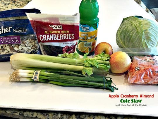Apple Cranberry Almond Cole Slaw | Can't Stay Out of the Kitchen | this #coleslaw is amazing. It's filled with #apples #almonds #craisins #celery & #carrots in a tasty #Greekyogurt dressing. Healthy, low calorie & #glutenfree. #cabbage