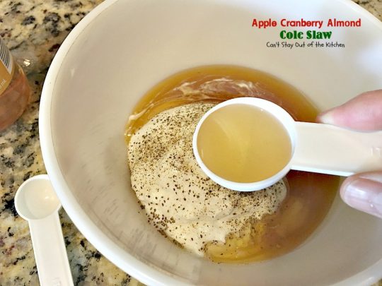Apple Cranberry Almond Cole Slaw | Can't Stay Out of the Kitchen | this #coleslaw is amazing. It's filled with #apples #almonds #craisins #celery & #carrots in a tasty #Greekyogurt dressing. Healthy, low calorie & #glutenfree. #cabbage