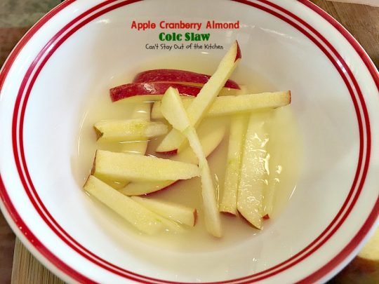 Apple Cranberry Almond Cole Slaw | Can't Stay Out of the Kitchen | this #coleslaw is amazing. It's filled with #apples #almonds #craisins #celery & #carrots in a tasty #Greekyogurt dressing. Healthy, low calorie & #glutenfree. #cabbage