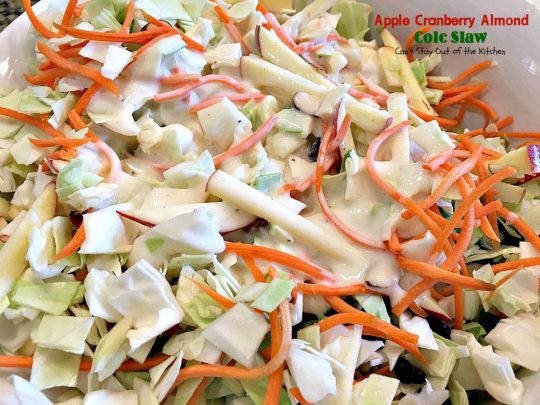 Apple Cranberry Almond Cole Slaw | Can't Stay Out of the Kitchen | this #coleslaw is amazing. It's filled with #apples #almonds #craisins #celery & #carrots in a tasty #Greekyogurt dressing. Healthy, low calorie & #glutenfree. #cabbage