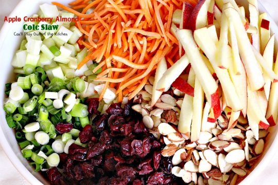 Apple Cranberry Almond Cole Slaw | Can't Stay Out of the Kitchen | this #coleslaw is amazing. It's filled with #apples #almonds #craisins #celery & #carrots in a tasty #Greekyogurt dressing. Healthy, low calorie & #glutenfree. #cabbage