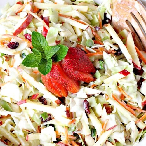 Apple Cranberry Almond Cole Slaw | Can't Stay Out of the Kitchen | this #coleslaw is amazing. It's filled with #apples #almonds #craisins #celery & #carrots in a tasty #Greekyogurt dressing. Healthy, low calorie & #glutenfree. #cabbage
