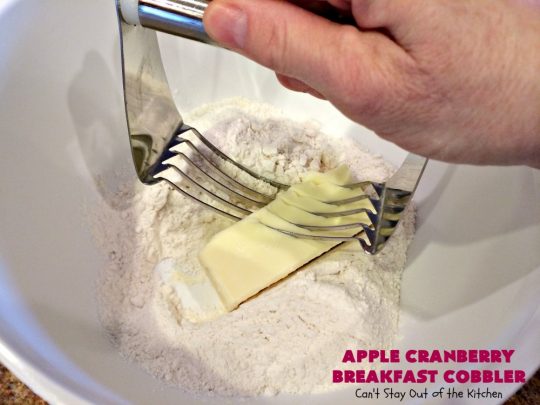 Apple Cranberry Breakfast Cobbler | this amazing #recipe is half #cobbler and half #CoffeeCake. It's made with a can of #AppleCranberryPieFilling & tastes absolutely scrumptious. It's great for a #holiday #breakfast like #Thanksgiving or #Christmas. Every bite will have you drooling! #AppleCranberryBreakfastCobbler #BreakfastCobbler #HolidayBreakfast