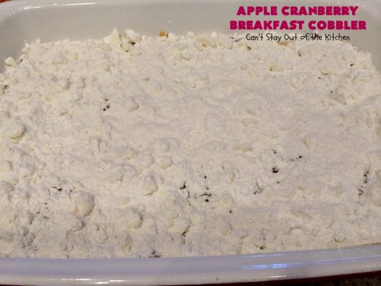 Apple Cranberry Breakfast Cobbler | this amazing #recipe is half #cobbler and half #CoffeeCake. It's made with a can of #AppleCranberryPieFilling & tastes absolutely scrumptious. It's great for a #holiday #breakfast like #Thanksgiving or #Christmas. Every bite will have you drooling! #AppleCranberryBreakfastCobbler #BreakfastCobbler #HolidayBreakfast