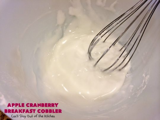 Apple Cranberry Breakfast Cobbler | this amazing #recipe is half #cobbler and half #CoffeeCake. It's made with a can of #AppleCranberryPieFilling & tastes absolutely scrumptious. It's great for a #holiday #breakfast like #Thanksgiving or #Christmas. Every bite will have you drooling! #AppleCranberryBreakfastCobbler #BreakfastCobbler #HolidayBreakfast