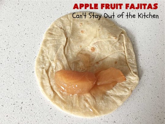 Apple Fruit Fajitas | Can't Stay Out of the Kitchen | these lovely #fruit-flavored #fajitas include #ApplePieFilling & a syrup is poured over top before baking. So easy to whip up for a quick #dessert. Also good for #breakfast! These use #CaramelApple pie filling making them even better! #apples #CaramelApples #AppleFruitFajitas #AppleDessert