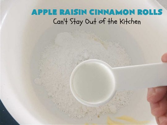 Apple Raisin Cinnamon Rolls | Can't Stay Out of the Kitchen | These luscious #CinnamonRolls are outstanding. They're light, airy, fluffy & yes, irresistible. Perfect for a weekend, company or #holiday #breakfast or #brunch like #Thanksgiving, #Christmas, #Easter or #NewYearsDay. This #NoKnead #Recipe is so easy since it's partially made in the #breadmaker! #HolidayBreakfast #apples #raisins #AppleRaisinCinnamonRolls