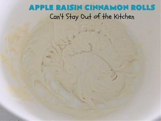 Apple Raisin Cinnamon Rolls | Can't Stay Out of the Kitchen | These luscious #CinnamonRolls are outstanding. They're light, airy, fluffy & yes, irresistible. Perfect for a weekend, company or #holiday #breakfast or #brunch like #Thanksgiving, #Christmas, #Easter or #NewYearsDay. This #NoKnead #Recipe is so easy since it's partially made in the #breadmaker! #HolidayBreakfast #apples #raisins #AppleRaisinCinnamonRolls
