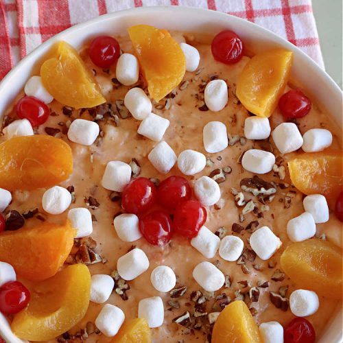 Apricot Fluff | Can't Stay Out of the Kitchen | this festive & elegant fluff-type #FruitSalad is made with #CreamCheese #VanillaPudding, #apricots, #pineapple, #marshmallows, #CoolWhip & #ApricotJello. It's a terrific #salad for company or #holiday dinners, potlucks, backyard BBQs or an family get-together. #ApricotFluff #GlutenFree