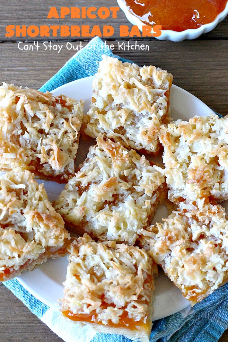 Apricot Shortbread Bars | these luscious #cookies have a #shortbread crust, spread with #Apricot jelly & topped with a scrumptious #coconut topping. Terrific for #tailgating parties, potlucks or #ChristmasCookieExchanges. #dessert #ApricotDessert #HolidayDessert #ApricotShortbreadBars