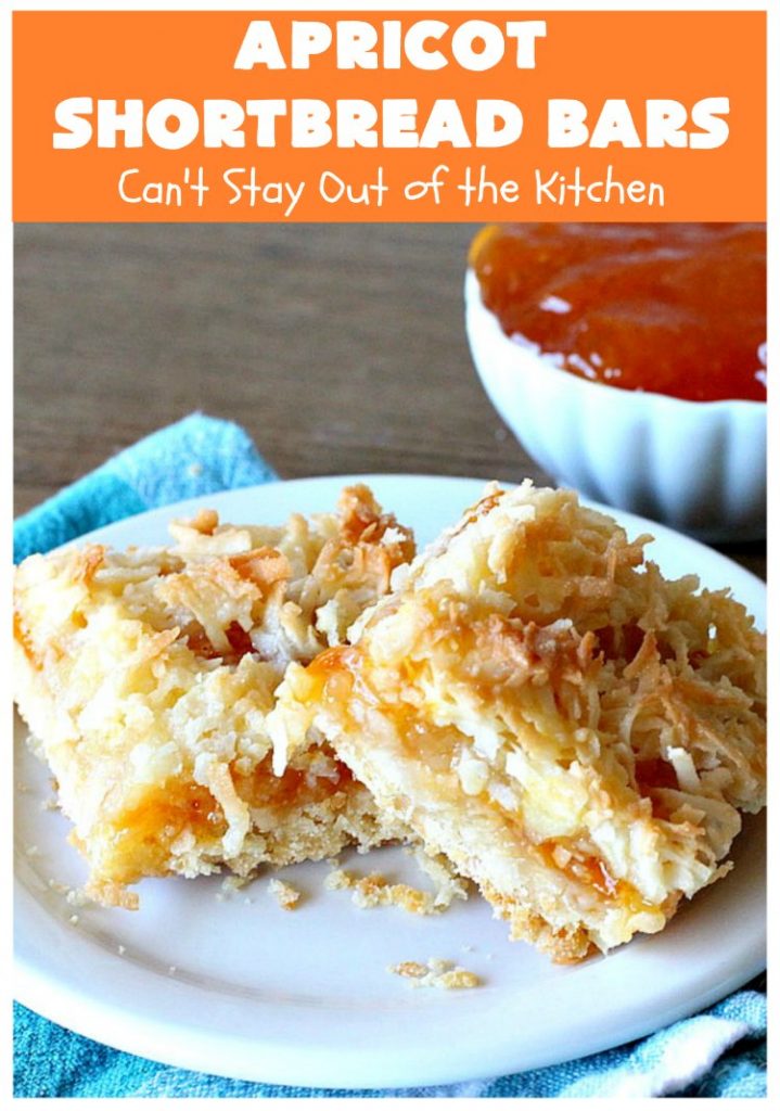 Apricot Shortbread Bars | these luscious #cookies have a #shortbread crust, spread with #Apricot jelly & topped with a scrumptious #coconut topping. Terrific for #tailgating parties, potlucks or #ChristmasCookieExchanges. #dessert #ApricotDessert #HolidayDessert #ApricotShortbreadBars