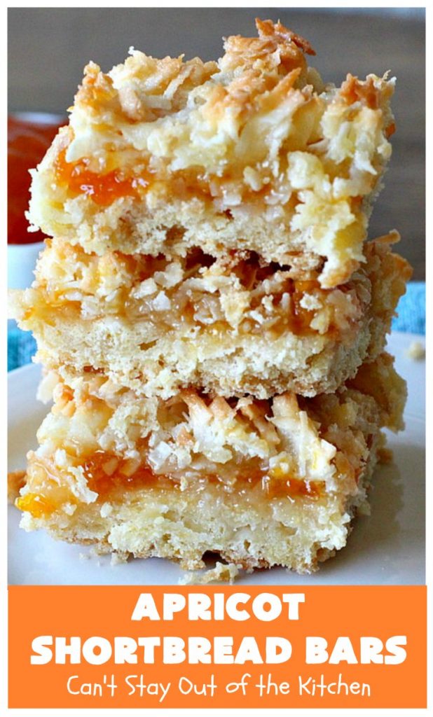 Apricot Shortbread Bars | these luscious #cookies have a #shortbread crust, spread with #Apricot jelly & topped with a scrumptious #coconut topping. Terrific for #tailgating parties, potlucks or #ChristmasCookieExchanges. #dessert #ApricotDessert #HolidayDessert #ApricotShortbreadBars
