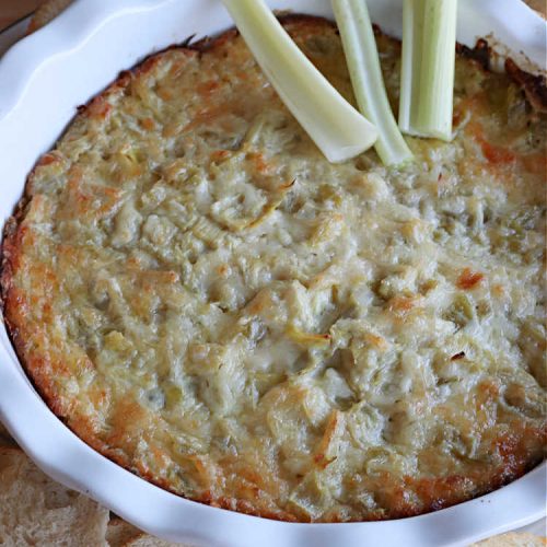 Artichoke Dip | Can't Stay Out of the Kitchen | this delicious #ArtichokeDip uses only 5 ingredients & is perfect for #NewYearsEve, #NewYearsDay, #tailgating or #SuperBowl parties. Includes #Mozzarella & #Parmesan cheeses & diced #GreenChilies to amp up the flavors. #appetizer #GlutenFree #HolidayAppetizer
