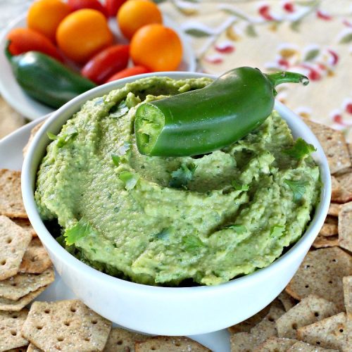 Avocado Cilantro Hummus | Can't Stay Out of the Kitchen | this fantastic #TexMex #appetizer is irresistible. It includes #avocados, #ChickPeas, #Cilantro & a little #Jalapeno. It's terrific for #tailgating parties, potlucks, #LaborDay parties or anytime you want a #healthy, #LowCalorie, #GlutenFree, #Vegan & delicious snack. Serve with #VeggieDippers for a #CleanEating #recipe. #AvocadoCilantroHummus #hummus #GarbanzoBeans #VeganAppetizer #GlutenFreeAppetizer