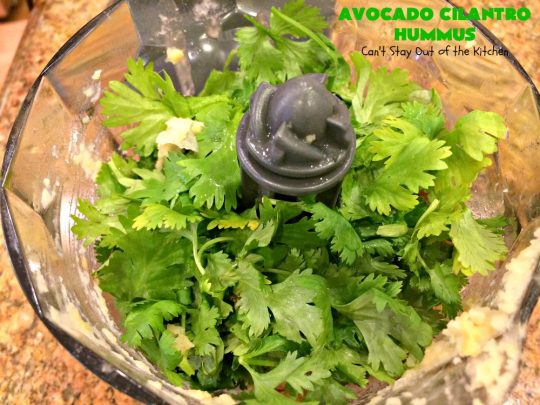 Avocado Cilantro Hummus | Can't Stay Out of the Kitchen | this fantastic #TexMex #appetizer is irresistible. It includes #avocados, #ChickPeas, #Cilantro & a little #Jalapeno. It's terrific for #tailgating parties, potlucks, #LaborDay parties or anytime you want a #healthy, #LowCalorie, #GlutenFree, #Vegan & delicious snack. Serve with #VeggieDippers for a #CleanEating #recipe. #AvocadoCilantroHummus #hummus #GarbanzoBeans #VeganAppetizer #GlutenFreeAppetizer