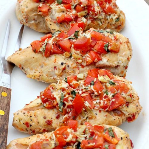 Baked Chicken Bruschetta | Can't Stay Out of the Kitchen | this easy 6-ingredient #recipe is always a winner when we make it. The #chicken turns out so moist & delicious. Terrific for #holidays like #Easter or #MothersDay. #Bruschetta #ChickenBruschetta #tomatoes #Basil #GlutenFree #RoastedGarlic #mozzarellacheese #GlutenFreeChickenRecipe #EasterMainDish #MothersDayMainDish