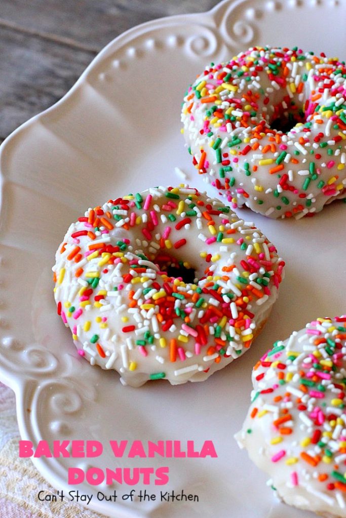 Baked Vanilla Donuts | Can't Stay Out of the Kitchen | Wow your #Thanksgiving or #Christmas #breakfast guests with these spectacular homemade #donuts. They are glazed 3 times in vanilla icing before adding #sprinkles. I made them a day in advance & they were still heavenly. #holiday #holidaybreakfast #ThanksgivingBreakfast #BakedDonuts #ChristmasBreakfast #vanilladonuts