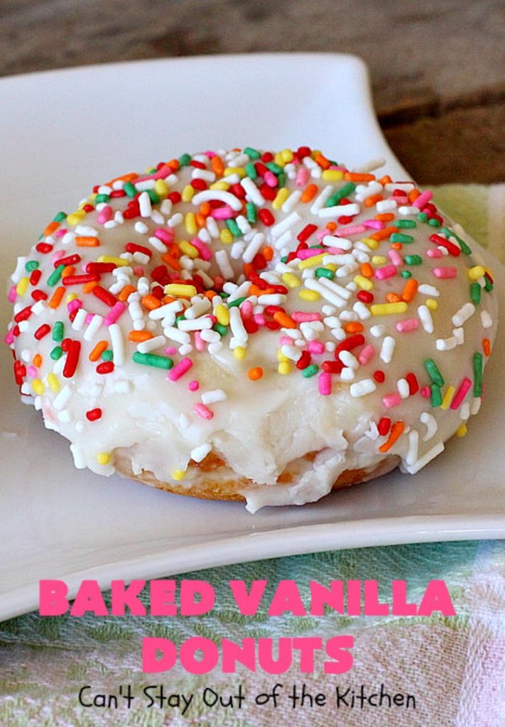 Baked Vanilla Donuts | Can't Stay Out of the Kitchen | Wow your #Thanksgiving or #Christmas #breakfast guests with these spectacular homemade #donuts. They are glazed 3 times in vanilla icing before adding #sprinkles. I made them a day in advance & they were still heavenly. #holiday #holidaybreakfast #ThanksgivingBreakfast #BakedDonuts #ChristmasBreakfast #vanilladonuts