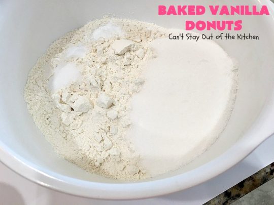Baked Vanilla Donuts | Can't Stay Out of the Kitchen | Wow your #Thanksgiving or #Christmas #breakfast guests with these spectacular homemade #donuts. They are glazed 3 times in vanilla icing before adding #sprinkles. I made them a day in advance & they were still heavenly. #holiday #holidaybreakfast #ThanksgivingBreakfast #BakedDonuts #ChristmasBreakfast #vanilladonuts