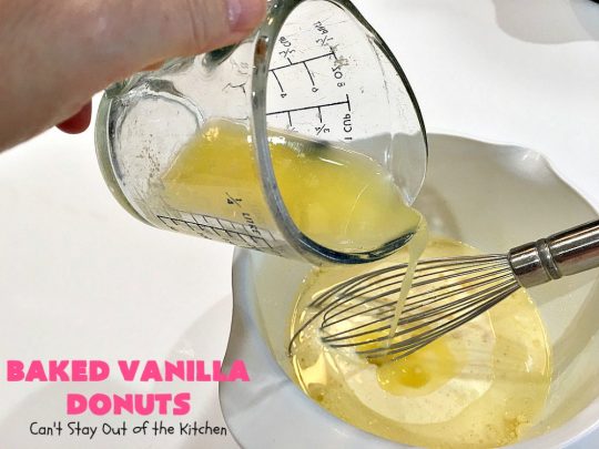 Baked Vanilla Donuts | Can't Stay Out of the Kitchen | Wow your #Thanksgiving or #Christmas #breakfast guests with these spectacular homemade #donuts. They are glazed 3 times in vanilla icing before adding #sprinkles. I made them a day in advance & they were still heavenly. #holiday #holidaybreakfast #ThanksgivingBreakfast #BakedDonuts #ChristmasBreakfast #vanilladonuts