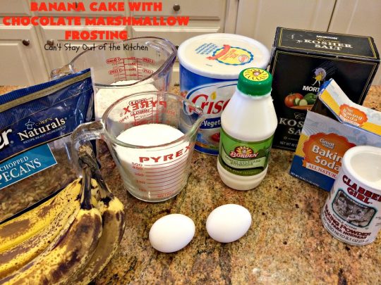 Banana Cake with Chocolate Marshmallow Frosting | Can't Stay Out of the Kitchen | this fantastic #cake is our favorite. It has a spectacular #chocolate & #marshmallow frosting to die for! Prepare to drool after the first bite! #dessert #bananas #almonds