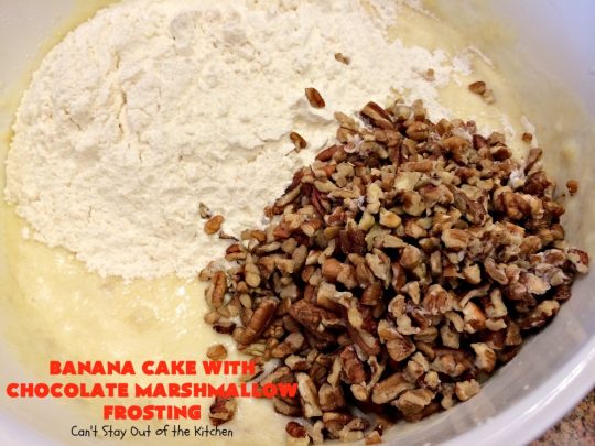 Banana Cake with Chocolate Marshmallow Frosting | Can't Stay Out of the Kitchen | this fantastic #cake is our favorite. It has a spectacular #chocolate & #marshmallow frosting to die for! Prepare to drool after the first bite! #dessert #bananas #almonds