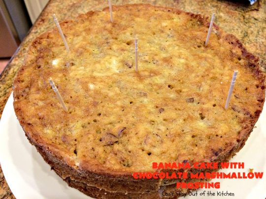 Banana Cake with Chocolate Marshmallow Frosting | Can't Stay Out of the Kitchen | this fantastic #cake is our favorite. It has a spectacular #chocolate & #marshmallow frosting to die for! Prepare to drool after the first bite! #dessert #bananas #almonds