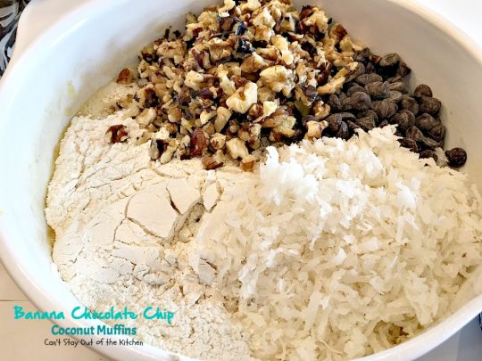 Banana Chocolate Chip Coconut Muffins | Can't Stay Out of the Kitchen | We adored these delectable #muffins filled with #bananas, #coconut #chocolatechips, #walnuts & almond flavoring. Great choice for a #holiday #breakfast.