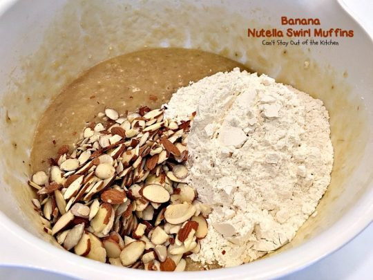 Banana Nutella Swirl Muffins | Can't Stay Out of the Kitchen | these #muffins are divine! You won't be able to stop eating them. Great for a #holiday #breakfast, too. #bananas #almonds #nutella