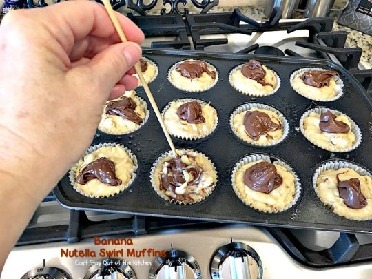Banana Nutella Swirl Muffins | Can't Stay Out of the Kitchen | these #muffins are divine! You won't be able to stop eating them. Great for a #holiday #breakfast, too. #bananas #almonds #nutella