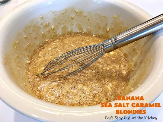 Banana Sea Salt Caramel Blondies | Can't Stay Out of the Kitchen | these amazing #brownies have triple the #caramel flavor with caramel chips in the cookie, icing and caramel sauce drizzled over top! Perfect #dessert for potlucks, #tailgating parties, summer #holiday fun or backyard #BBQs. #cookies #bananas