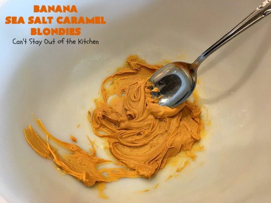 Banana Sea Salt Caramel Blondies | Can't Stay Out of the Kitchen | these amazing #brownies have triple the #caramel flavor with caramel chips in the cookie, icing and caramel sauce drizzled over top! Perfect #dessert for potlucks, #tailgating parties, summer #holiday fun or backyard #BBQs. #cookies #bananas